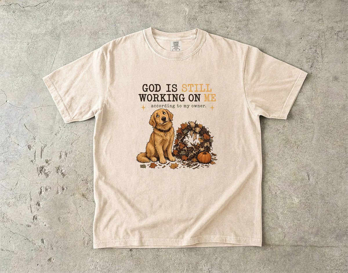 God Is Still Working On Me According To My Owner Funny Christian Dog Shirt | Golden Retriever Fall Faith Tee | Funny Dog Mom Christian Shirt