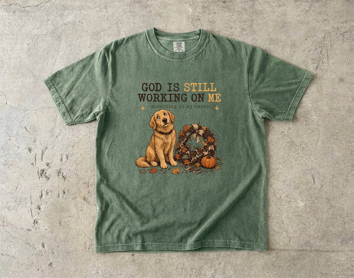 God Is Still Working On Me According To My Owner Funny Christian Dog Shirt | Golden Retriever Fall Faith Tee | Funny Dog Mom Christian Shirt