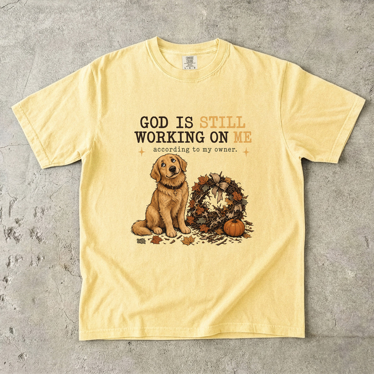 God Is Still Working On Me According To My Owner Funny Christian Dog Shirt | Golden Retriever Fall Faith Tee | Funny Dog Mom Christian Shirt